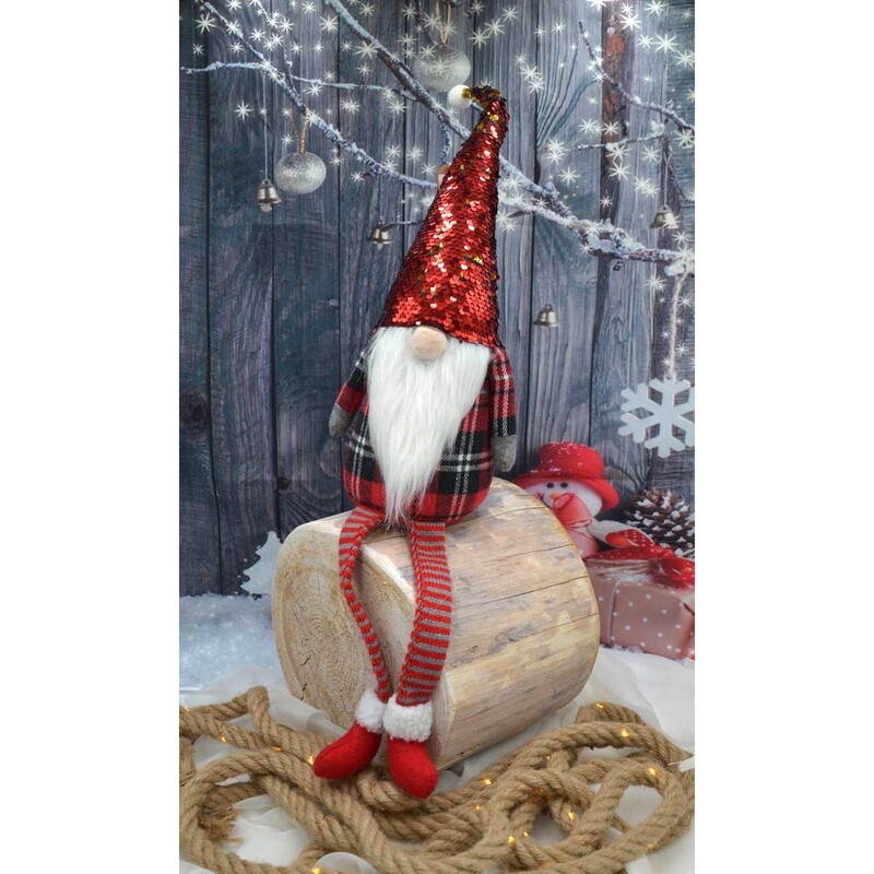 Ziemassvētku elfs ar spīdīgu cepuri