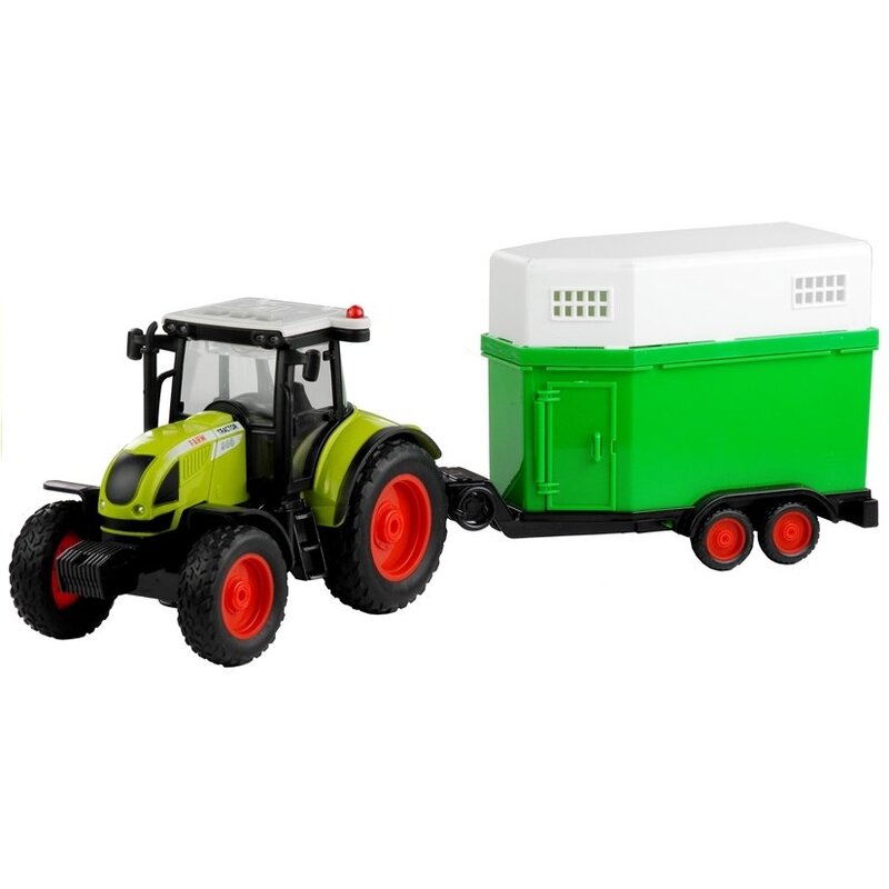 Traktors ar piekabi dzīvnieku pārvadāšanai