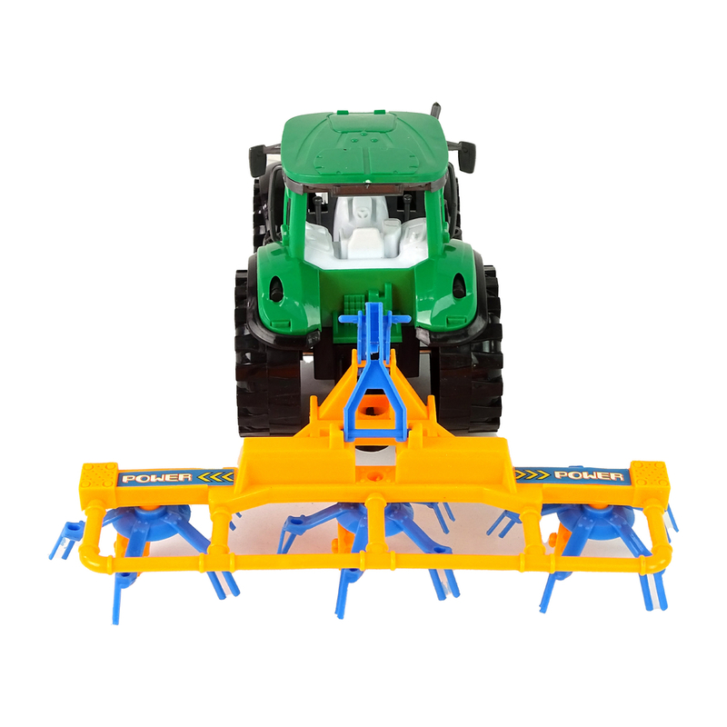 Zaļš traktors ar oranžu un zilu grābekļa berzes piedziņu