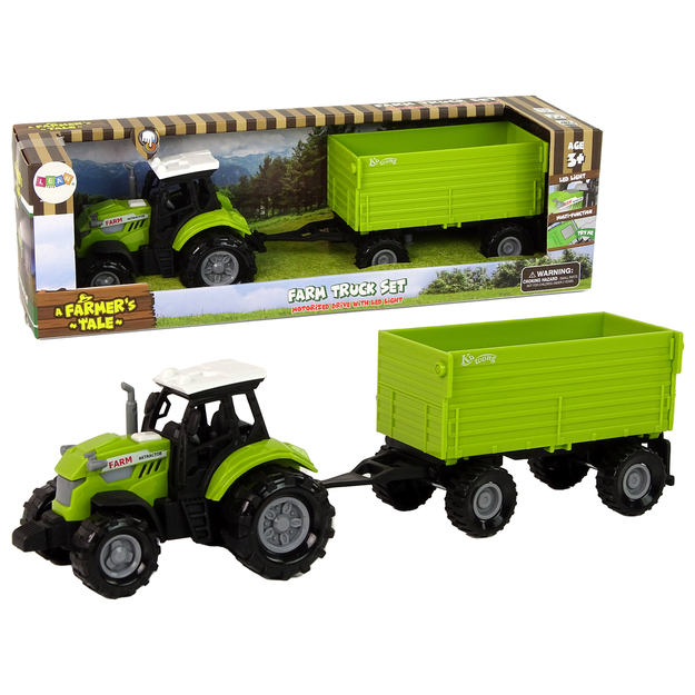 Lauksaimniecības traktors ar piekabi, zaļš